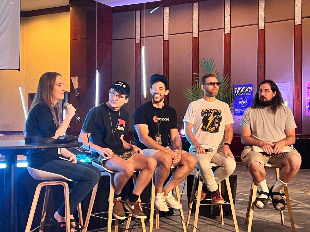 A panel session on the Q Branch stage