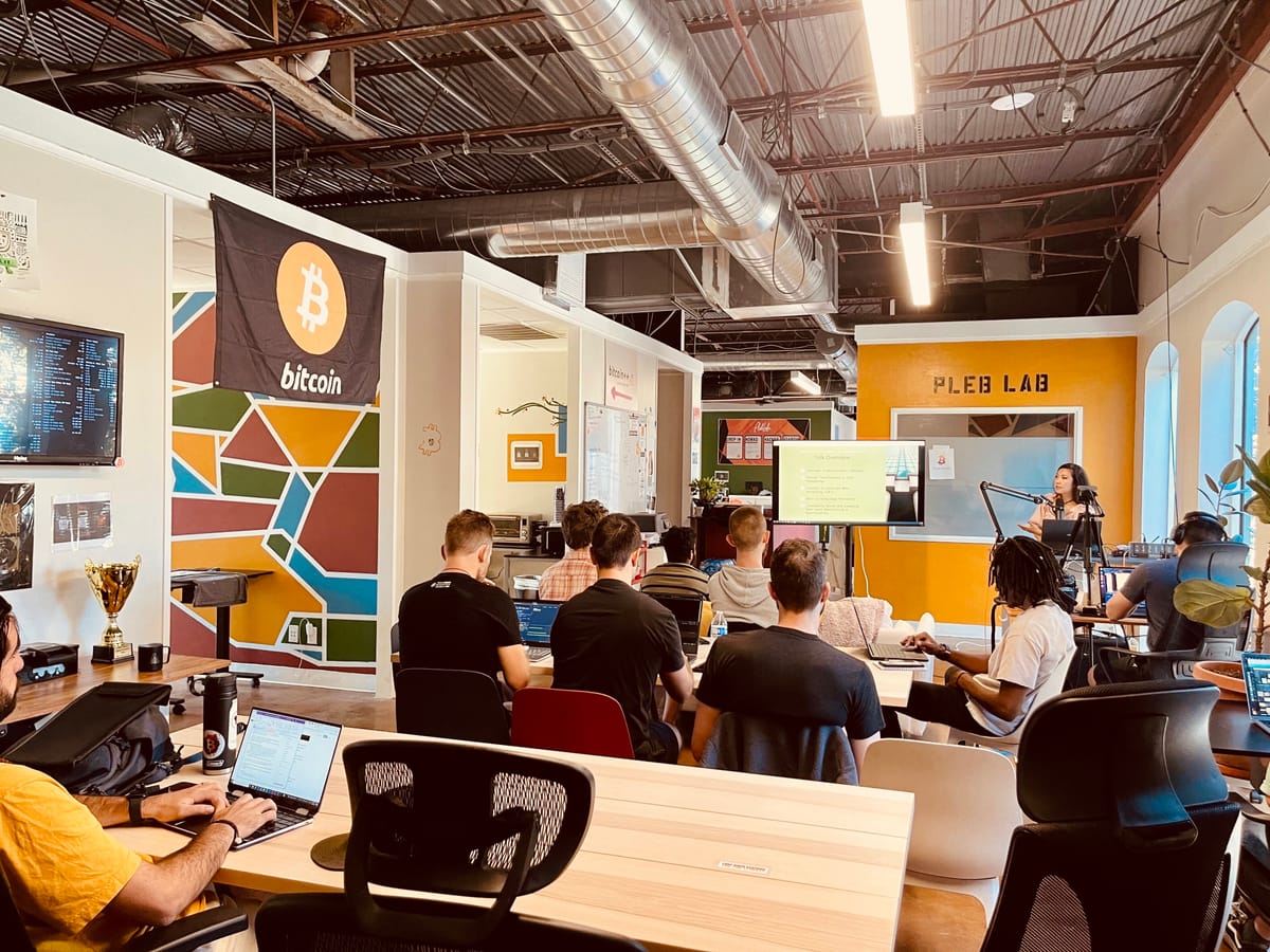 Builders at laptops at an Austin community event